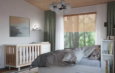 Уютная спальня с детской кроваткой, большой кроватью и деревянным потолком